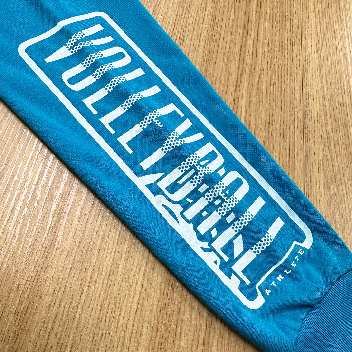 ロングスリーブTシャツ2025 ターコイズ(レッド×ホワイト)